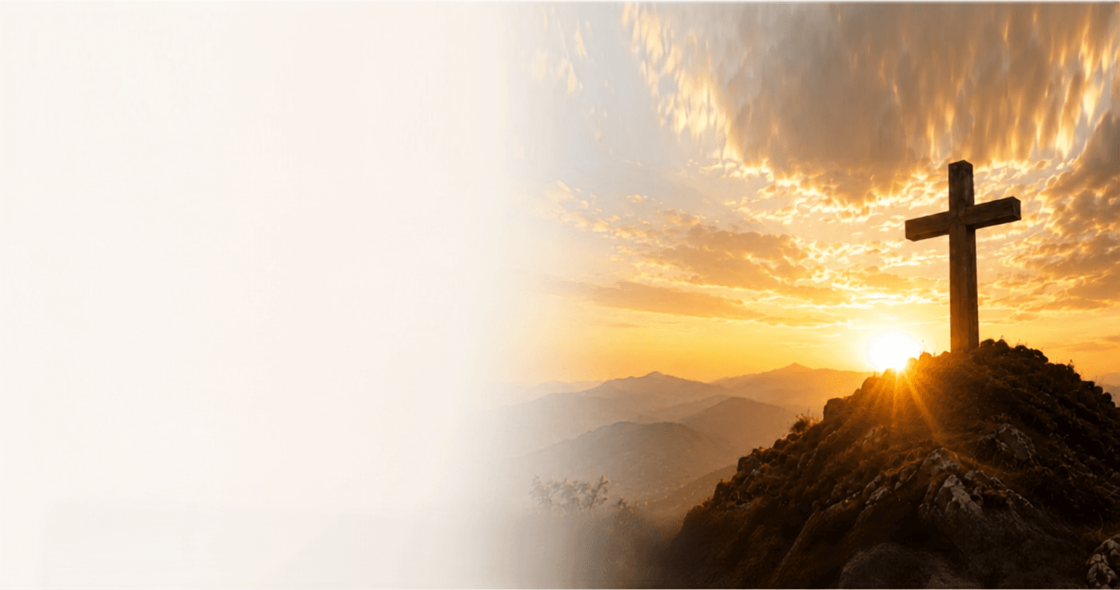 Cross at sunrise over the mountains