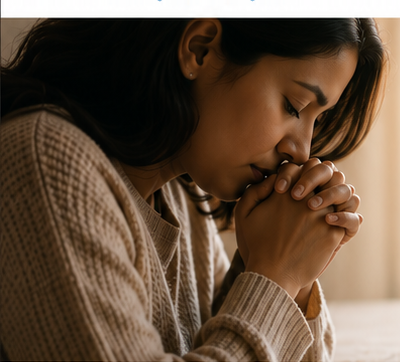 A woman in quiet prayer beside Scripture — peace, presence, and care